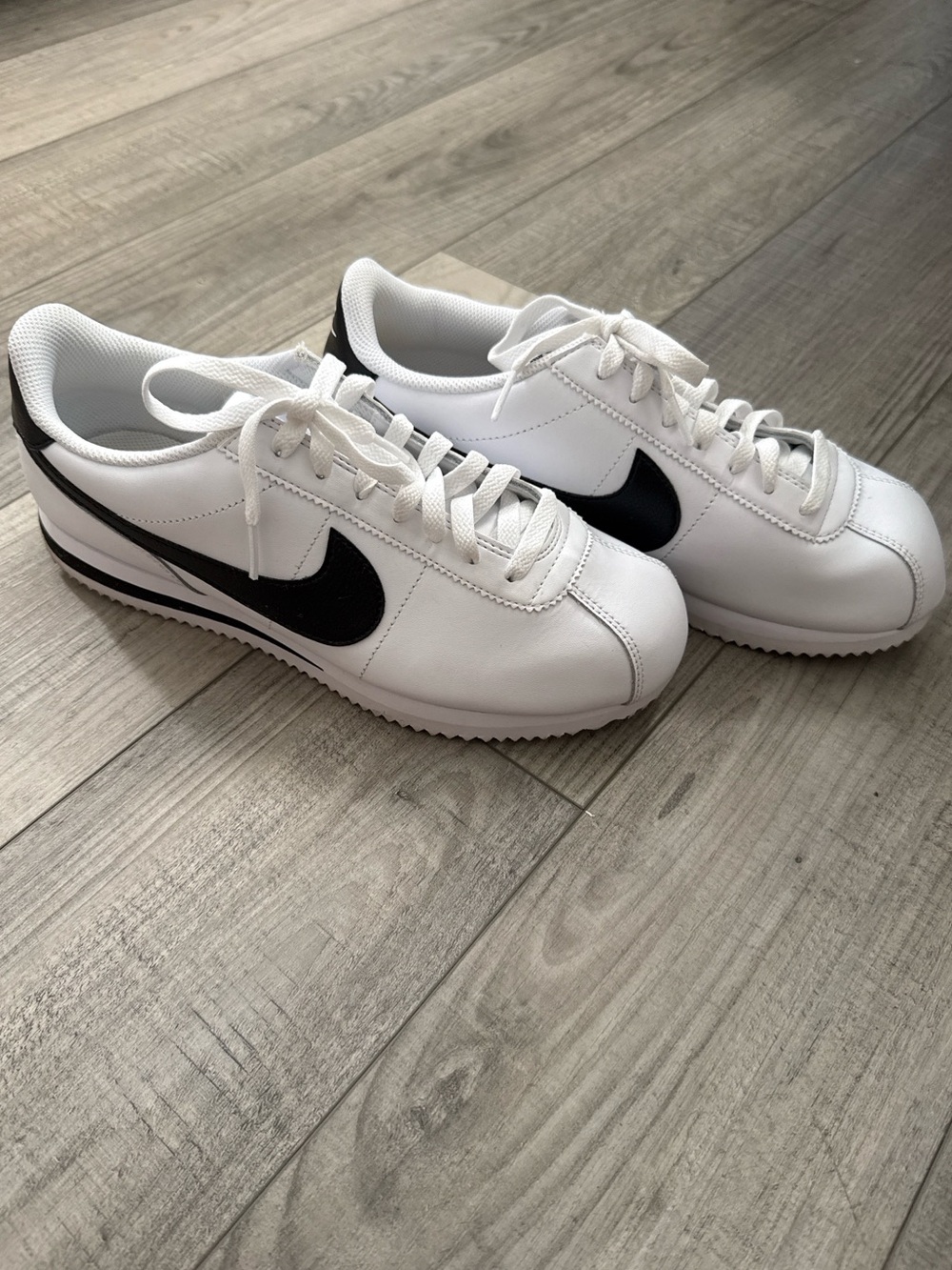 Nike Cortez White Leather Sneakers with Black Swoosh